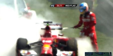 PIC: Fernando Alonso putting out fires all over the shop at Brazilian Grand Prix