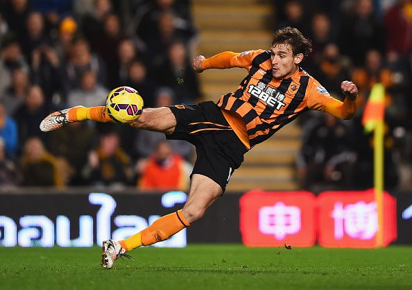 HULL, ENGLAND - NOVEMBER 23: Nikica Jelavic of Hull City volleys the ball during the Barclays Premier League match between Hull City and Tottenham Hotspur at KC Stadium on November 23, 2014 in Hull, England.  (Photo by Laurence Griffiths/Getty Images)