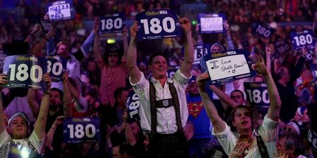 Irish students con teacher into saying 180 and launch into darts chant