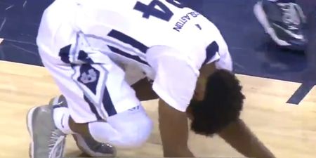 College player crashes on his arse after strong dunk