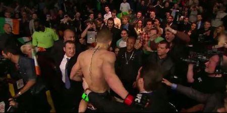 Video: Conor McGregor leaps out of the Octagon and squares up to Jose Aldo