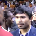 Manny Pacquiao and Floyd Mayweather exchange pleasantries at NBA game