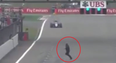 Video: Man runs across F1 track during practice session, breaks into Ferrari garage and asks for a car