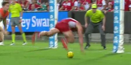 AFL player nearly goes head over heels scoring one of the best goals in Aussie Rules history