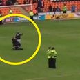 Video: Crowd erupts as man in mobility scooter joins Blackpool’s pitch protest