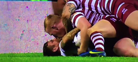 Video: Super League player distracts his opponent by kissing him on the lips