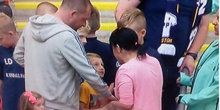 PICS: Woman appeared to grab Beckford’s jersey from a young fan