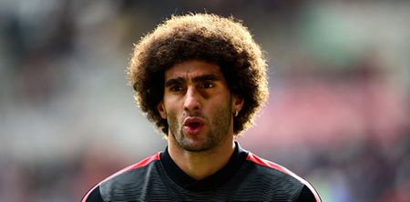 Pic: Marouane Fellaini appears to have gone on holidays to the 1970s