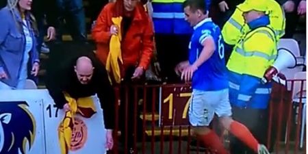 Vine: Motherwell supporter smacks Rangers star in the face with a flagpole