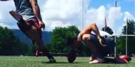 VIDEO: Brave or stupid? American footballer uses teammates nose as a kicking tee