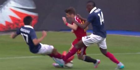 GIF: Two-footed horror tackle not enough to warrant a yellow card from referee
