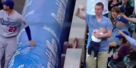 WATCH: Some men can feed a newborn and casually catch a baseball at the exact same time