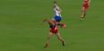 Video: Aussie Rules star Lindsay Thomas surfs player’s back to claim absolutely outrageous mark