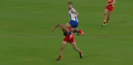 Video: Aussie Rules star Lindsay Thomas surfs player’s back to claim absolutely outrageous mark