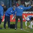 VIDEO: Gheorghe Hagi flings his own player back onto the pitch after time-wasting stunt