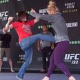 WATCH: Holly Holm lets fan repeatedly kick her in the gut ahead of Ronda Rousey fight