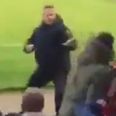 WATCH: Bravest (most stupid) fan in England decides to start fighting the entire away end