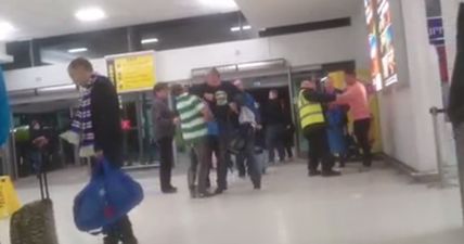 WATCH: Celtic and Rangers supporters clash at Belfast airport just hours after Old Firm derby