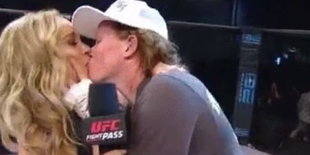 WATCH: Tonya Evinger with the vomit in a bucket/kiss the announcer combination at Invicta 17