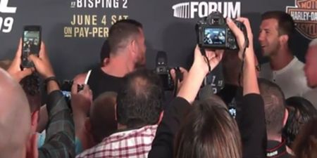 WATCH: Michael Bisping and Luke Rockhold have to be held apart during post-fight altercation