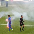 This might explain why Croatian supporters threw flares onto the pitch