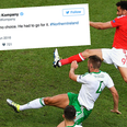 People rally around Gareth McAuley after his own goal knocked Northern Ireland out