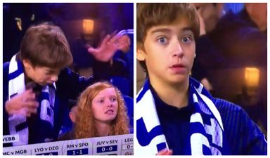 Frustrated young Porto fan accidentally bashes girl on the head as he reacts to late missed chance