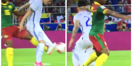 Cameroon player quite literally tackles the shorts off his Chilean opponent
