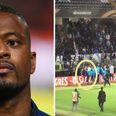 Patrice Evra sent off for kicking his own supporter in the head