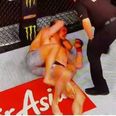 Georges St-Pierre chokes Michael Bisping unconscious to become UFC champion