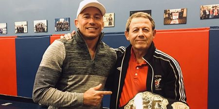 Georges St-Pierre gives new middleweight belt away to old wrestling coach