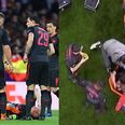 Diego Costa consoles Laurent Koscielny after he wails on the ground in pain