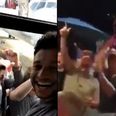 Alex Oxlade-Chamberlain is mobbed by fans while Carragher sings Salah song