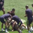 Philippe Coutinho has eggs and flour thrown on him by Brazil teammates