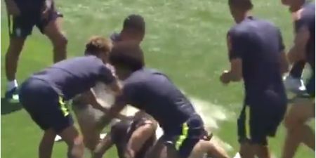Philippe Coutinho has eggs and flour thrown on him by Brazil teammates