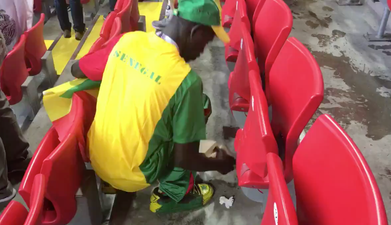 Senegal fans spotted cleaning up after themselves after Poland victory