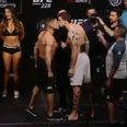 UFC fighters kiss on stage
