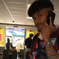 Tyrone Mings arrives at Bournemouth station still in full Aston Villa kit day after playoff win