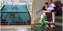 Japan team wade through knee high levels of floods as Typhoon begins