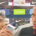 Virgil van Dijk pushes fan who storms him for a selfie during interview