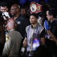 Boxer races off stage to ‘protect mother’ in post-fight brawl