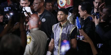 Boxer races off stage to ‘protect mother’ in post-fight brawl