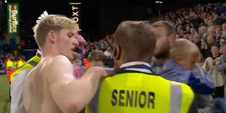 Everton fan clashes with steward after dropping child to grab Anthony Gordon’s shirt