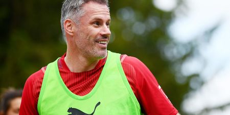 Jamie Carragher snatches phone from fan after being goaded in angry exchange
