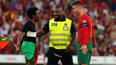 Cristiano Ronaldo involved in bizarre interaction with pitch invader